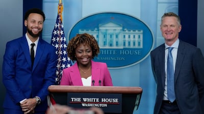 White House Press Secretary Karine Jean-Pierre introduces special guests Golden State Warriors head coach Steve Kerr, right, and Curry at the daily briefing on Tuesday. AP