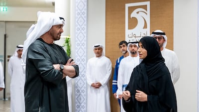 Sheikh Mohamed listens to a presentation before the Adnoc board of directors meeting