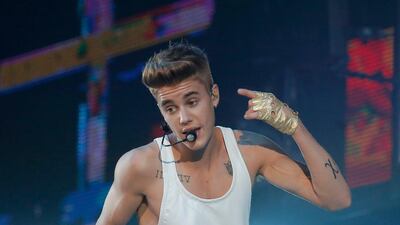 Justin Bieber performing during a concert at Bercy arena in Paris in March 2013. Francois Mori / AP Photo