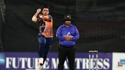 Danish Qureshi of MGM bowls during the Sharjah Ramadan Cup final.