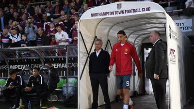 Manchester United manager Jose Mourinho and Zlatan Ibrahimovic make their way out of the tunnel. Shaun Botterill / Getty Images