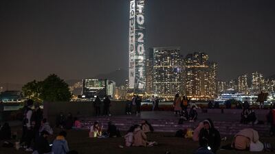 People celebrate at Tamar Park on New Year's Eve in Hong Kong, China. Bloomberg
