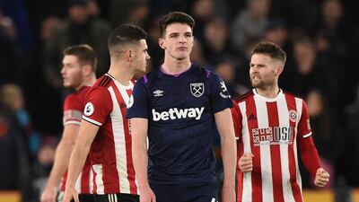 West Ham midfielder Declan Rice looks dejected after a 1-0 defeat to Sheffield United. AFP