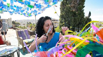 Nissan creates art from plastic bags, glass bottles, soda cans and sweets wrappers.