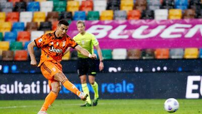 Juventus' Cristiano Ronaldo scores their first goal from the penalty spot. Reuters