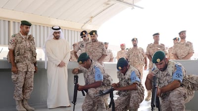 Sheikh Hamdan observes military training. Courtesy Wam