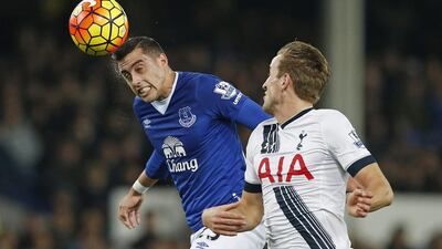 Everton’s Ramiro Funes Mori in action with Tottenham’s Harry Kane. Andrew Yates / Reuters