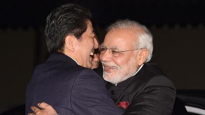 The Japanese prime minister Shinzo Abe welcomes his Indian counterpart, Narendra Modi, at the state guest house in Kyoto on August 30, 2014. Toru Yamanaka / AFP