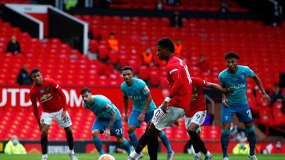 Manchester United's Marcus Rashford scores from the penalty spot. AP
