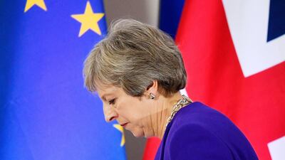 FILE PHOTO: Britain's Prime Minister Theresa May leaves a news conference at the European Union leaders summit in Brussels, Belgium October 18, 2018. REUTERS/Toby Melville/File Photo