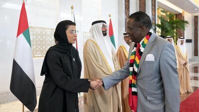 Noura Al Kaabi, UAE Minister of Culture and Knowledge Development, greets Emmerson Mnangagwa, President of Zimbabwe, during a reception at the Presidential Airport. Ryan Carter for the Ministry of Presidential Affairs
