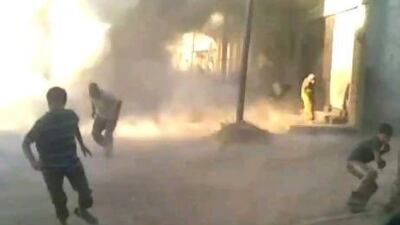 A frame grab made from an amateur video provided by Syrian activists purports to show the massacre in Houla on May 25 that killed more than 100 people. The authenticity of this image cannot be independently verified. Amateur Video via AP video / AP Photo