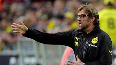 Juergen Klopp has attracted a lot of attention since guiding Borussia Dortmund to the Bundesliga title last season. Marius Becker / EPA