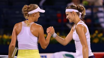 Caroline Wozniacki is congratulated by Lucie Safarova after Wozniacki won in straight sets. Julian Finney/Getty Images