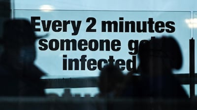 A notice warns of the speed that Coronavirus is spreading. EPA