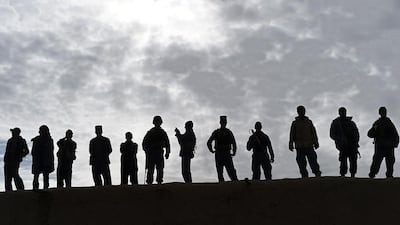 Afghan security forces keep watch during Afghanistan’s Chief Executive Officer Abdullah Abdullah’s official visit to the Yahya Khail district, in Paktika province. Shah Marai / AFP