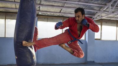 Sadam Chakari, who recently represented Afghanistan at the Asian Indoor and Martial Arts Games, is seen here practising Sambo, a Soviet martial art brought to Afghanistan during the Soviet occupation. Kern Hendricks