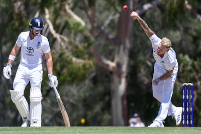 England captain Ben Stokes bowls during a warm-up match against England Lions in Perth. AFP