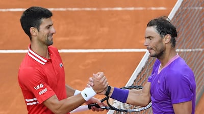 Rafael Nadal and Novak Djokovic after the 2021 Italian Open final. AFP