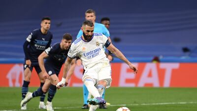 Karim Benzema scores Real Madrid's third goal to knock Manchester City out in the Champions League semi-final in 2022. Getty