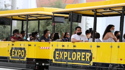 Visitors enjoying the ride in the EXPO Explorer train at the EXPO 2020 site in Dubai on 3 October, 2021. Pawan Singh/The National.