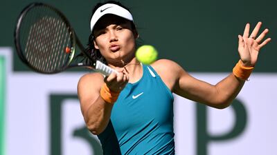 Mar 11, 2022; Indian Wells, CA, USA; Emma Raducanu (GBR) hits a shot as she defeats Caroline Garcia (FRA) in a second round match at the BNP Paribas Open at the Indian Wells Tennis Garden. Mandatory Credit: Jayne Kamin-Oncea-USA TODAY Sports