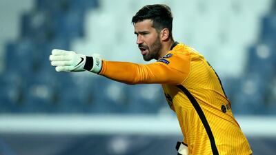 LIVERPOOL RATINGS: Alisson Becker - 7. Made a number of good saves, particularly from Muriel and Zapata. Quick off his line and excellent at starting Liverpool attacks. EPA