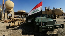 An Iraqi flag on a military vehicle at an oilfield in Dibis, on the outskirts of Kirkuk, in 2017. Reuters