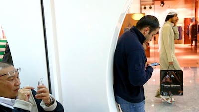 The Etisalat booth at Marina Mall in Abu Dhabi. Smartphone penetration across the GCC crossed the 50 per cent threshold early last year. Fatima Al Marzooqi / The National