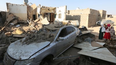 Girls stand at the site of a Houthi ballistic missile attack over the populated district of Rawda in Marib, Yemen February 6, 2020. Reuters
