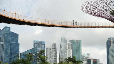 Several Singapore firms have favoured overseas listings this year. Roslan Rahman / AFP