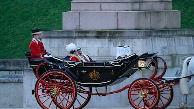 King Hamad arrives in a royal coach with his sons, Sheikh Nasser and Sheikh Khalid, to meet Britain's King Charles at Windsor Castle. AP