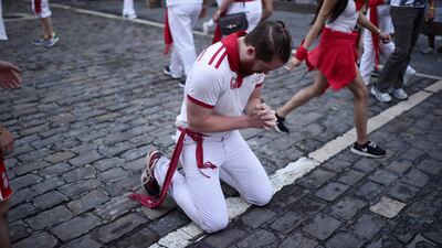 A runner prays before the event. Vincent West / Reuters