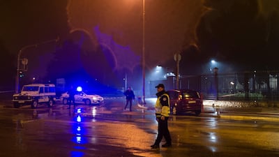 Police guard the entrance to the United States embassy building in Podgorica, Montenegro. Stevo Vasiljevic / Reuters