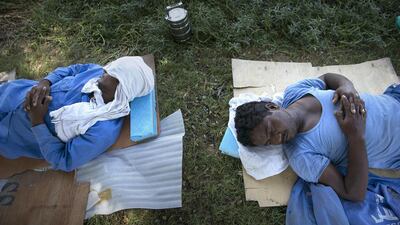 Labourers would like to see the midday break extended until October so they can continue taking shelter from the sun. Silvia Razgova / The National