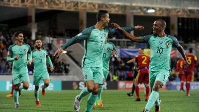 Cristiano Ronaldo celebrates after scoring the opening goal for Portugal in the 2018 World Cup qualifier against Andorra. Vincent West / Reuters