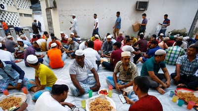 Bangladeshi migrant workers prepare to break fast in Singapore. Reuters