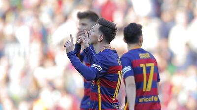 Barcelona's Lionel Messi celebrates after scoring a goal against Getafe in La Liga on Saturday. Manu Fernandez / AP / March 12, 2016