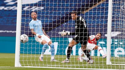 Arsenal's Pierre-Emerick Aubameyang scores his team's first goal during the FA Cup semifinal. AP