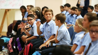 School gatherings will be suspended until further notice and physical distancing guidelines are in place to protect staff and pupils. Pawan Singh / The National