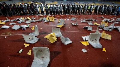 Fans of Egypt's Zamalek football club threw seats and stones towards police at the end of an African Champions League match against Libya's Al Ahli SC at the Borg El Arab stadium in Alexandria on July 9, 2017. Amr Abdallah Dalsh / Reuters