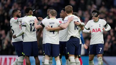 Tottenham players celebrate after teammate Harry Kane, second right, scored his side's opening goal during the English FA Cup soccer match between Tottenham Hotspur and Portsmouth at Tottenham Hotspur Stadium in London, Saturday, Jan. 7, 2023. (AP Photo / Kin Cheung)