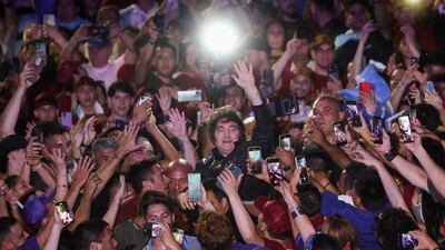 Argentina's President Javier Milei waves as he attends a La Libertad Avanza party closing rally before mid-term elections on October 26, in Rosario, Santa Fe. Reuters