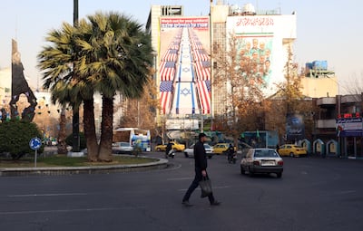 An anti-US and Israeli billboard in Tehran bears the message: 'Watch out for your soldiers'. EPA