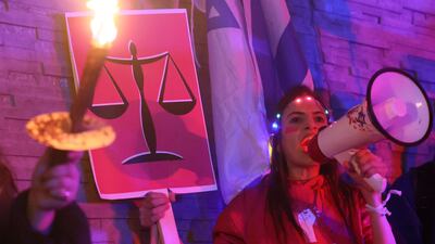 Israeli protesters attend a rally in central Tel Aviv. AFP