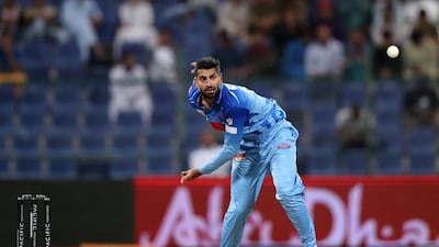 Karnataka Tuskers' Ahmed Raza bowls during the game against Bangla Tigers in the Abu Dhabi T10 league. Chris Whiteoak / The National