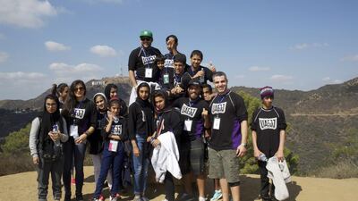 Part of the UAE Junior Jiu-Jitsu National Team gather for a group shot in front of the iconic Hollywood sign during a team hike on Thursday, October 16, 2014. Zachary Patton for The National