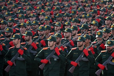 IRGC soldiers march in formation during an annual military parade. EPA