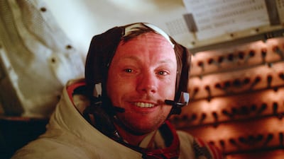Armstrong sits inside the Lunar Module after he and Buzz Aldrin completed their extravehicular activity on the surface of the moon. NASA / AP