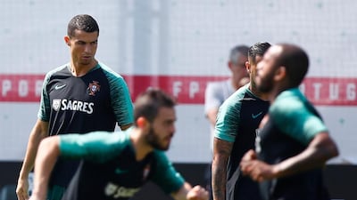 Cristiano Ronaldo and his teammates attend a training session. Axel Schmidt / Reuters